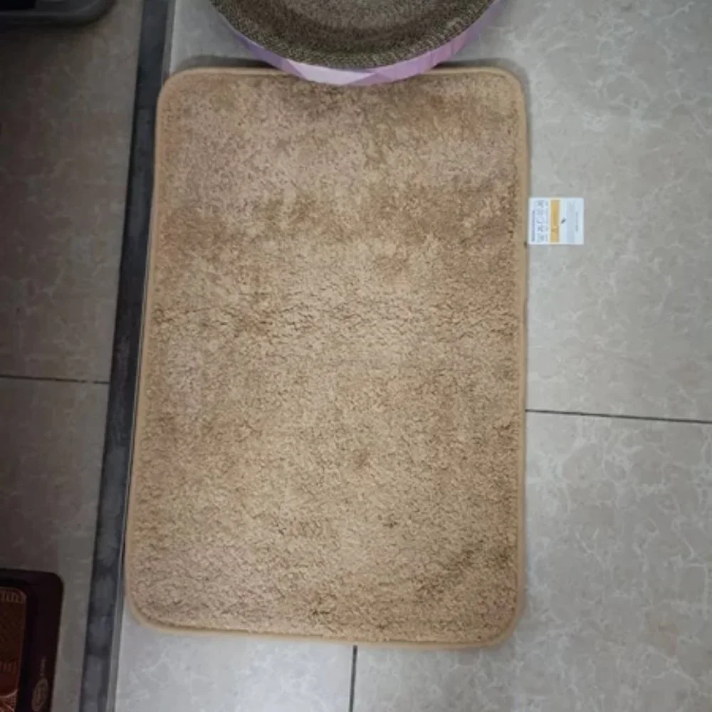 Bathroom and kitchen floor with blankets